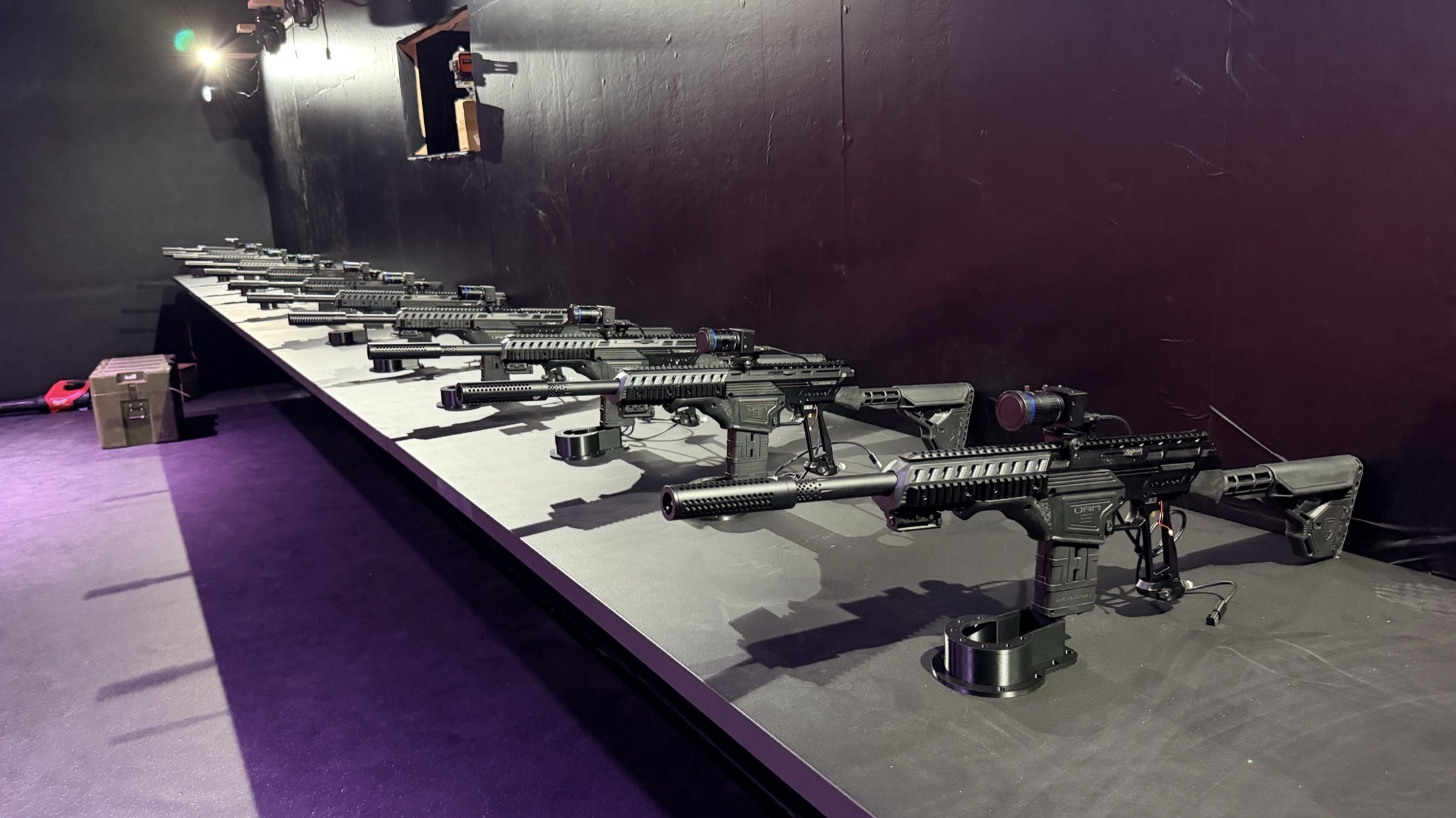 The Shov arena — a bench lined with real robotic gun turrets under the lights, Utah, USA